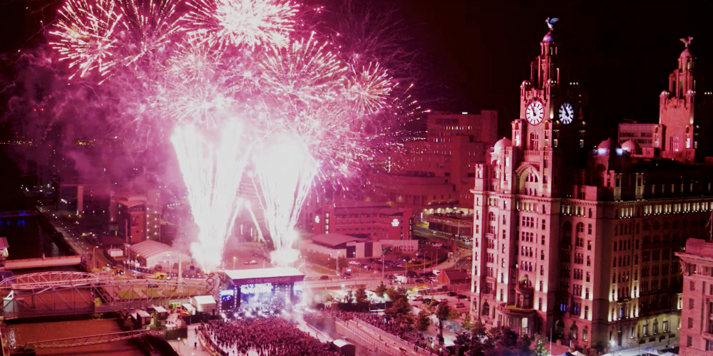 Liverpool Docks | Fireworks over Liverpool cityscape during a celebration event.